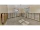 An unfinished room showing exposed framing and concrete block walls at 105 Crestview Dr, Englewood, FL 34223
