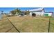 Large backyard with shed and grass at 13545 Overton Ave, Port Charlotte, FL 33981