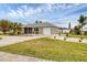 Newly built home with a spacious yard and driveway at 19483 Midway Blvd, Port Charlotte, FL 33948