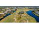 Wide aerial view of golf course community and waterways at 217 Rotonda Cir, Rotonda West, FL 33947