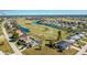 Aerial view of community near golf course and waterways at 217 Rotonda Cir, Rotonda West, FL 33947