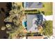 Aerial view showing house with private pool and canal view at 217 Rotonda Cir, Rotonda West, FL 33947