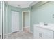 Bathroom with white vanity, tiled floor, and a shower/tub combo at 217 Rotonda Cir, Rotonda West, FL 33947