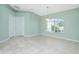 Simple dining room with light walls and tile floor at 217 Rotonda Cir, Rotonda West, FL 33947