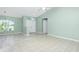 Bright dining room with tile floor and view to the front yard at 217 Rotonda Cir, Rotonda West, FL 33947
