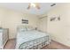 Cozy bedroom with a comfortable bed, closet space, and serene decor for peaceful relaxation at 404 Pine Hollow Cir # 404, Englewood, FL 34223