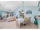 Open-concept living and dining area with lots of natural light at 404 Pine Hollow Cir # 404, Englewood, FL 34223