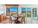 Enjoy beach views from this cozy dining area with seating for four and lots of natural light at 5000 Gasparilla Rd # Dc206, Boca Grande, FL 33921