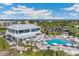 Aerial view of the resort showcasing the pool, clubhouse, and beach access at 5000 Gasparilla Rd # Dc206, Boca Grande, FL 33921