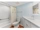 Updated bathroom with white vanity and tiled floor at 5000 Gasparilla Rd # Dc206, Boca Grande, FL 33921