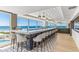 Ocean view bar with stylish seating and hexagonal tile floor at 5000 Gasparilla Rd # Dc206, Boca Grande, FL 33921