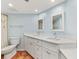 Bathroom features double vanity and light blue walls at 5000 Gasparilla Rd # Dc206, Boca Grande, FL 33921