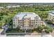 Aerial view of building showcasing its location and landscaping at 8541 Amberjack Cir # 202, Englewood, FL 34224