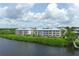 Aerial view of waterfront condo community at 2424 Placida Rd # C202, Englewood, FL 34224