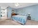 King bedroom with ceiling fan and ensuite bathroom access at 404 Pine Hollow Cir # 404, Englewood, FL 34223