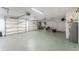 Spacious two-car garage with ample storage space at 110 Abercrombie Ave, Englewood, FL 34223