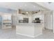 Well-equipped kitchen with ample cabinetry and granite countertops at 110 Abercrombie Ave, Englewood, FL 34223