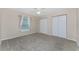 Bedroom with large closet and window at 110 Abercrombie Ave, Englewood, FL 34223