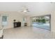Bright dining room with tiled floors and view of the pool at 110 Abercrombie Ave, Englewood, FL 34223