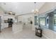 Modern kitchen with stainless steel appliances and granite countertops at 110 Abercrombie Ave, Englewood, FL 34223