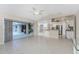 Bright Gathering room with sliding doors leading to the pool area at 110 Abercrombie Ave, Englewood, FL 34223