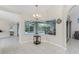 Bright breakfast nook with pool view at 110 Abercrombie Ave, Englewood, FL 34223