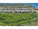 Wide aerial view of neighborhood and waterfront at 13025 Cedar Creek Dr, Port Charlotte, FL 33953