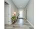 Spacious hallway with tile flooring and access to other rooms at 152 Apollo Dr, Rotonda West, FL 33947