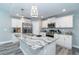 Spacious kitchen with white cabinets and granite countertops at 152 Apollo Dr, Rotonda West, FL 33947