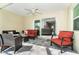 Covered patio with comfortable seating and view of the pool at 152 Apollo Dr, Rotonda West, FL 33947