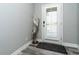 Bright entryway with tile flooring and decorative accents at 152 Apollo Dr, Rotonda West, FL 33947