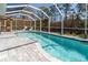 Enjoy this large refreshing pool and screened enclosure at 152 Apollo Dr, Rotonda West, FL 33947
