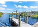 Convenient boat dock with lift for easy access at 15576 Aldama Cir, Port Charlotte, FL 33981