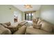 Living room with access to balcony and view of bedroom at 175 Kings Hwy # 236, Punta Gorda, FL 33983