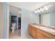 Bathroom features a vanity with sink, toilet and separate shower at 175 Kings Hwy # 236, Punta Gorda, FL 33983