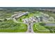 Aerial view of community with pool, tennis courts at 175 Kings Hwy # 236, Punta Gorda, FL 33983