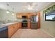 Modern kitchen with stainless steel appliances at 175 Kings Hwy # 236, Punta Gorda, FL 33983