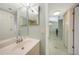 Clean bathroom with a vanity and view of the dining area at 175 Kings Hwy # 236, Punta Gorda, FL 33983
