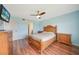 Bedroom with wood floors and ceiling fan at 175 Kings Hwy # 236, Punta Gorda, FL 33983