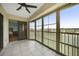 Spacious screened balcony with tile floors and golf course view at 175 Kings Hwy # 236, Punta Gorda, FL 33983