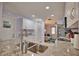 Modern kitchen with granite countertops and stainless steel appliances at 189 Carlisle Nw Ave, Port Charlotte, FL 33952