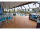 Covered patio with pool, hot tub, and outdoor seating at 189 Carlisle Nw Ave, Port Charlotte, FL 33952