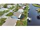 Aerial view of property with canal access and neighborhood context at 189 Carlisle Nw Ave, Port Charlotte, FL 33952