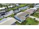 Aerial view of waterfront home and neighborhood at 189 Carlisle Nw Ave, Port Charlotte, FL 33952