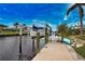 Private boat lift and dock with kayak on a peaceful canal at 189 Carlisle Nw Ave, Port Charlotte, FL 33952