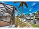 Peaceful canal view from the pool enclosure at 189 Carlisle Nw Ave, Port Charlotte, FL 33952
