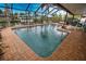 Inviting screened pool area with canal views at 189 Carlisle Nw Ave, Port Charlotte, FL 33952