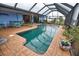 Large, refreshing pool with a spacious screened enclosure at 189 Carlisle Nw Ave, Port Charlotte, FL 33952