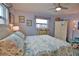 Main bedroom with a large bed, ample storage and natural light at 189 Carlisle Nw Ave, Port Charlotte, FL 33952