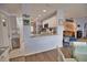 Kitchen with granite countertops and view into living room at 189 Carlisle Nw Ave, Port Charlotte, FL 33952